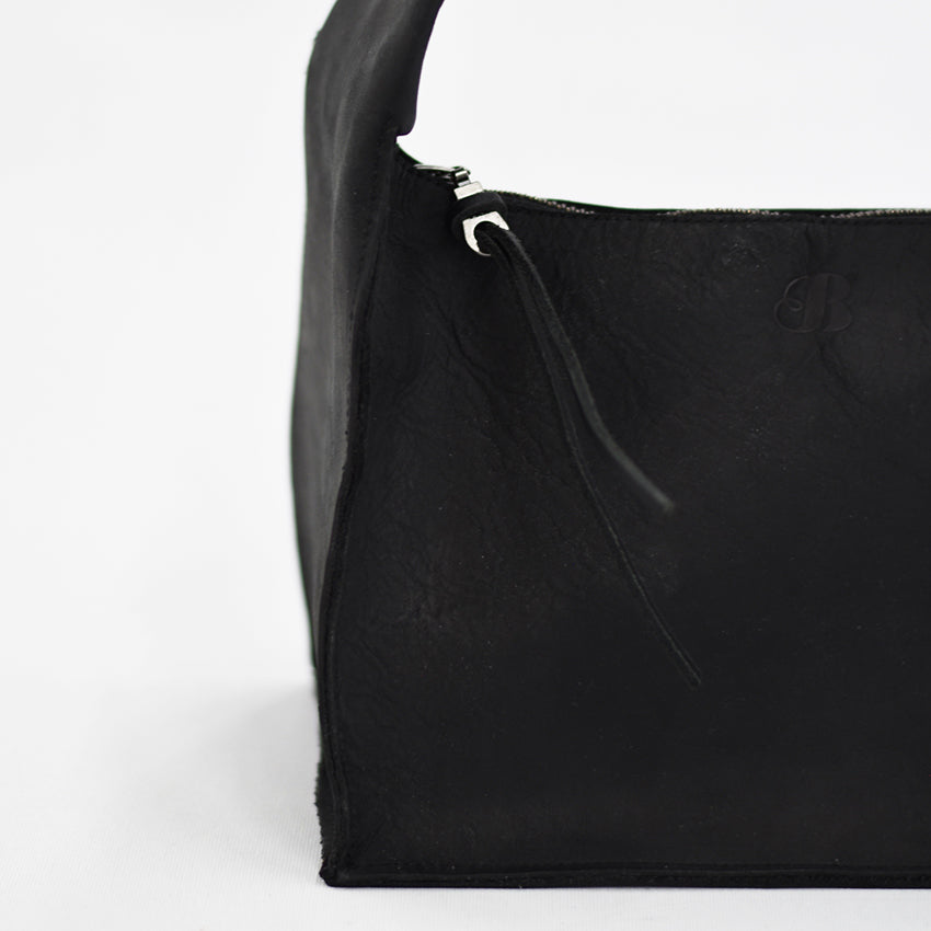 The Maude Trapezoid Bag - Black Bovine Leather