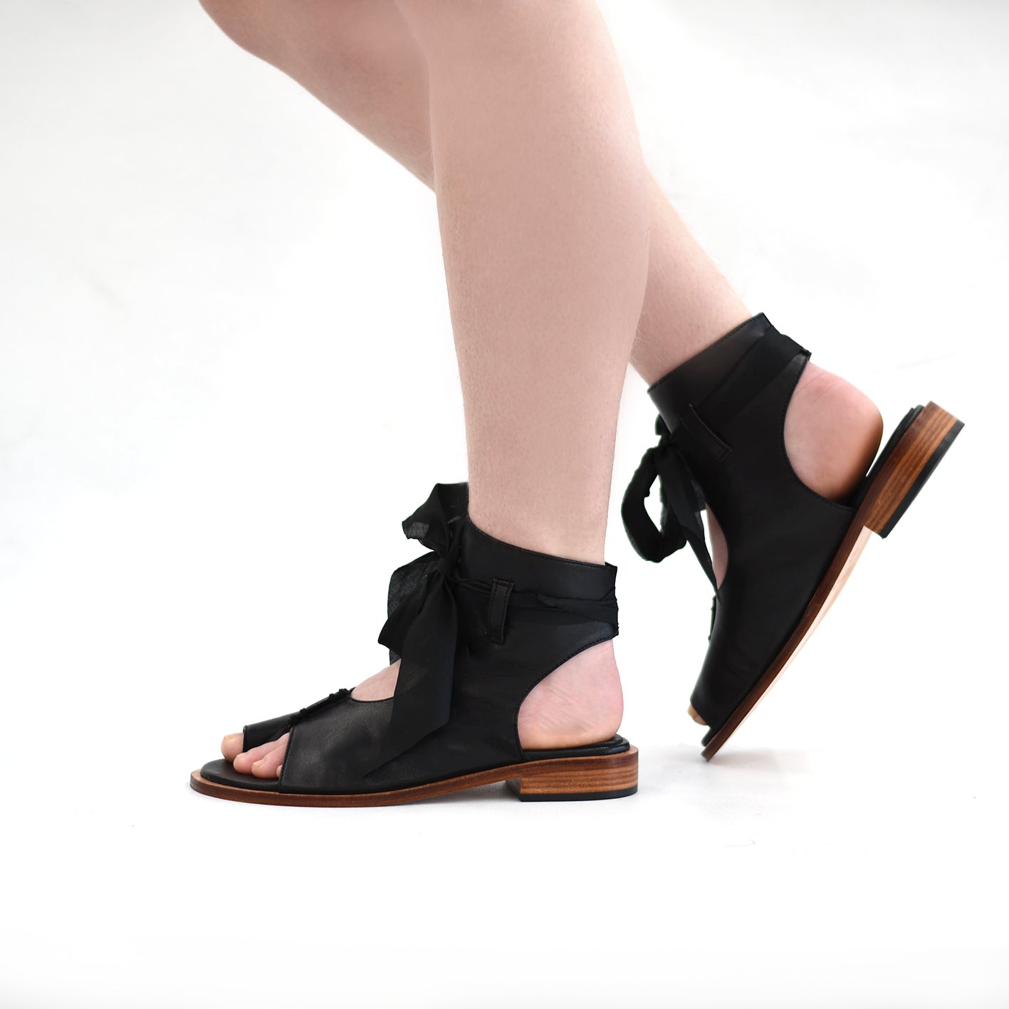 The Augusta Shoe - Black,  A pair of handcrafted leather sandals with intricate detailing